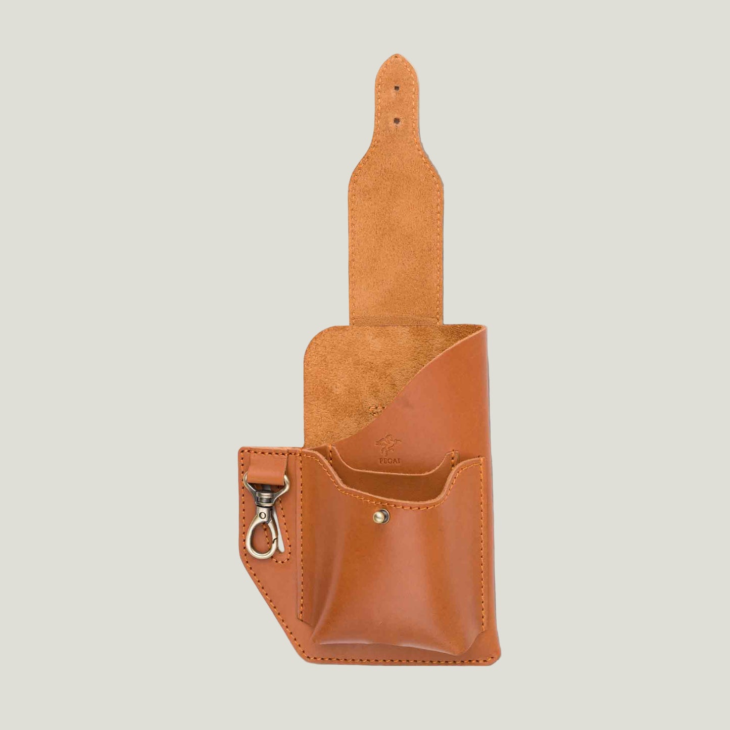 Handcrafted Tech Cowboy Leather Phone Holster in Maui Taba, designed for secure, hands-free carry. Features wallet pocket, ID slot, and key holder.