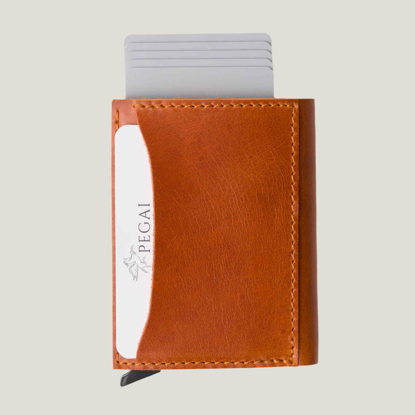 Handcrafted Mack Leather Trifold Wallet in Whiskey Brown—sleek, compact, and made from premium leather. Features quick card access and a timeless, elegant design.
