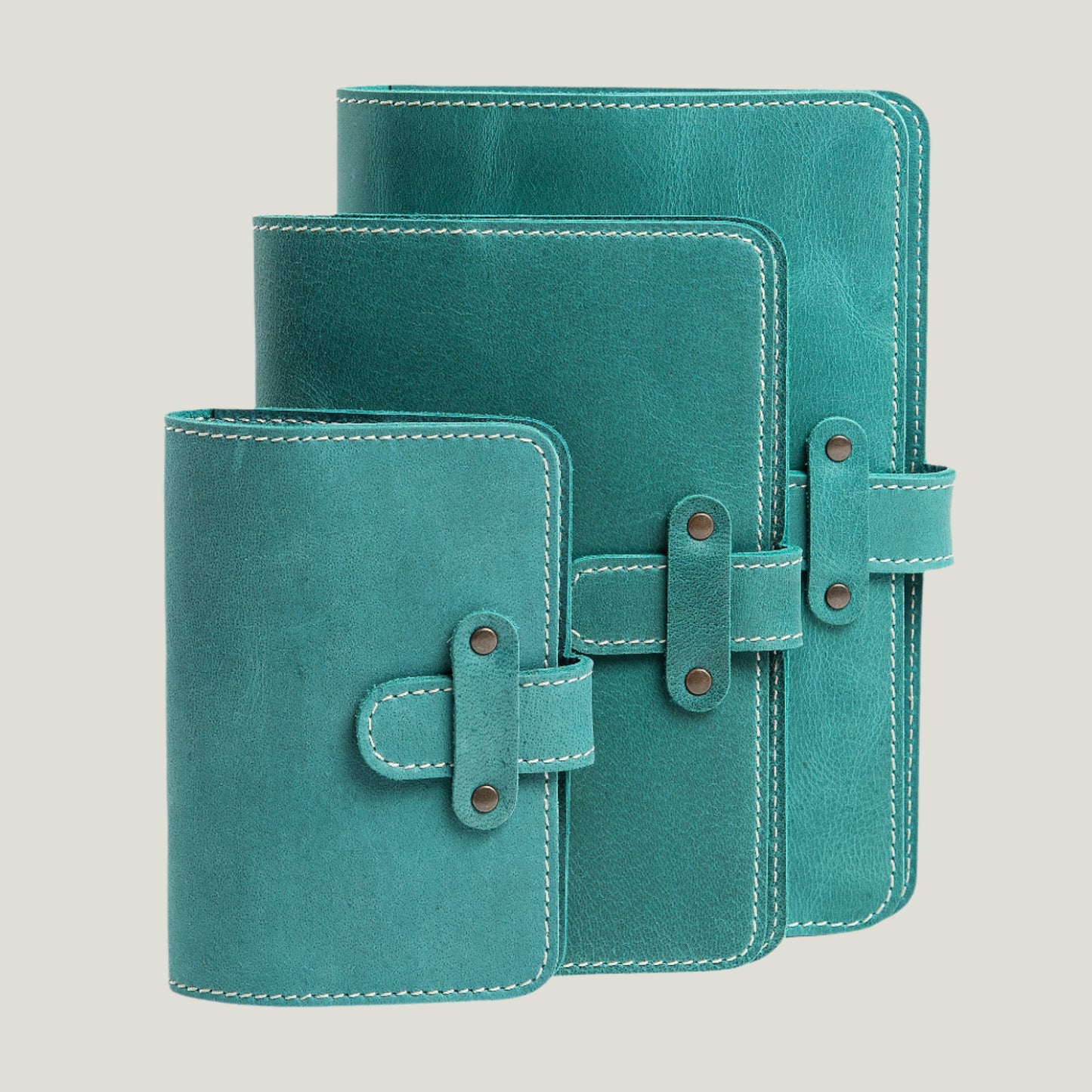 Turquoise DuPage Leather Journal – handcrafted, refillable, and customizable with fire-branded initials. Features antique brass hardware and a timeless design.
