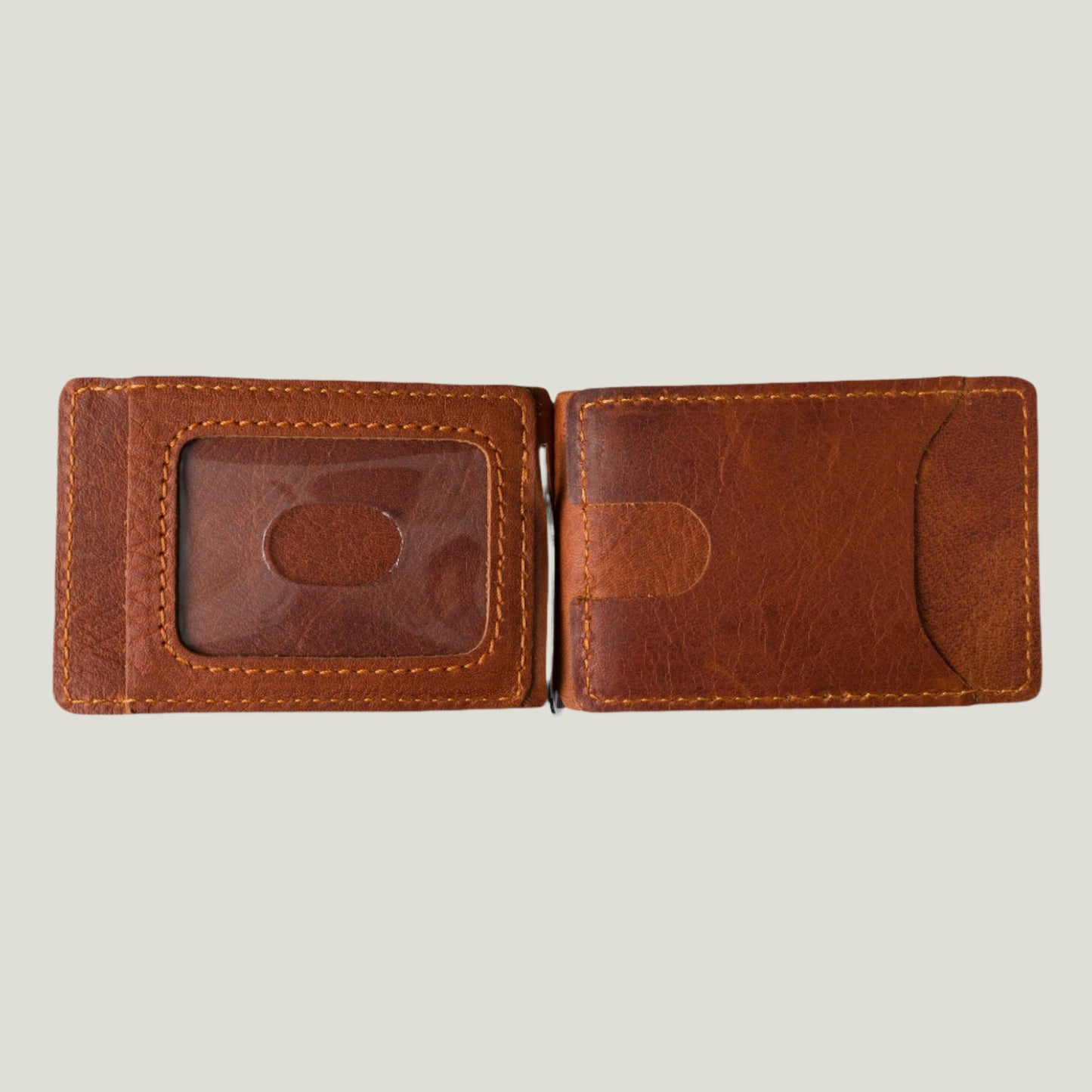 Close-up of the Max Leather Moneyclip Wallet in Frisco Rustic, showcasing its slim design, card slots, money clip, and fire-branded personalized initials.
