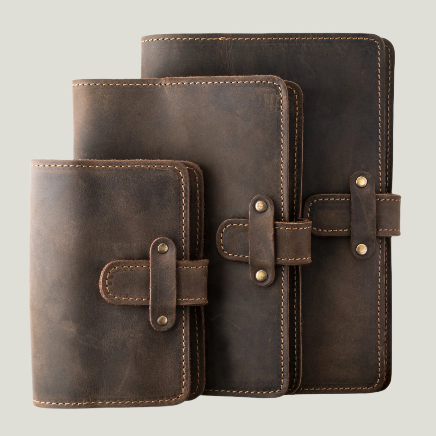 Handcrafted DuPage Leather Journal in Chestnut, featuring top-grain leather, antique brass accents, a pen loop, and refillable pages. Personalizable cover.