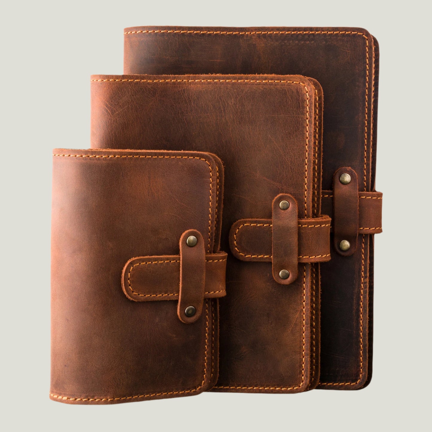 Handcrafted mahogany leather journal with antique brass hardware, refillable pages, and personalized initials—perfect for capturing your story in style.