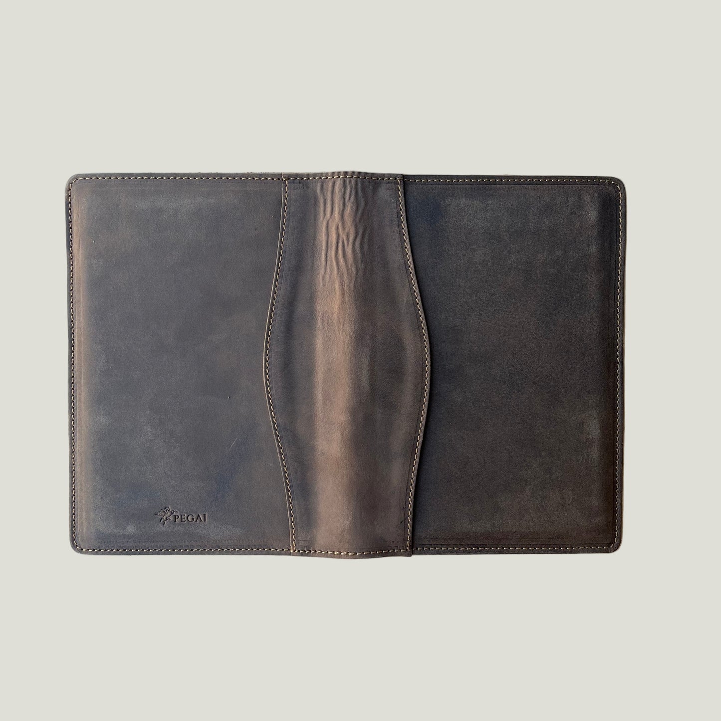 Back view of the leather padfolio in distressed chestnut brown, featuring natural wrinkles that highlight craftsmanship.