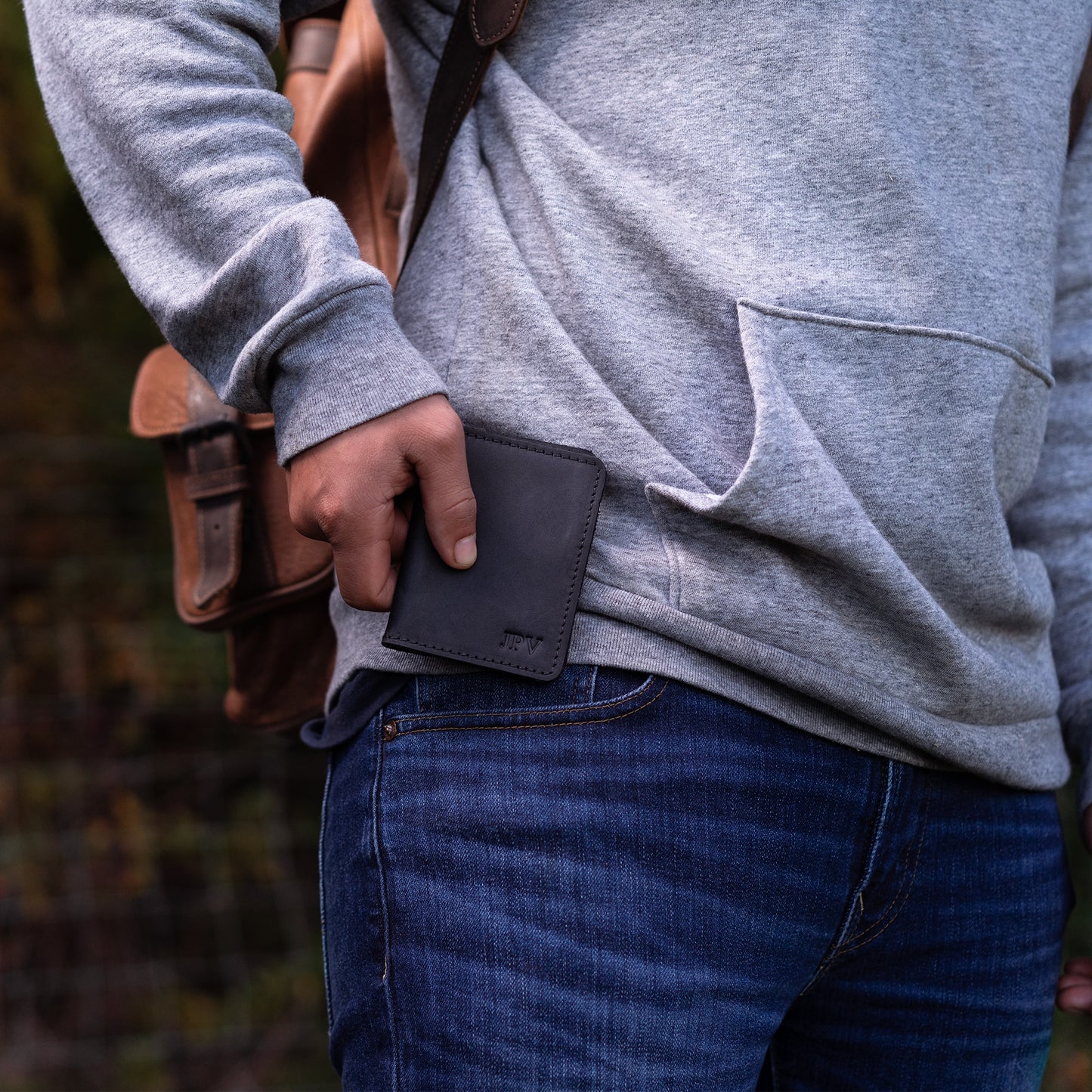 Charcoal Knox Bifold Wallet—sleek, handcrafted leather with card slots and hidden pockets. Personalizable with fire-branded initials.