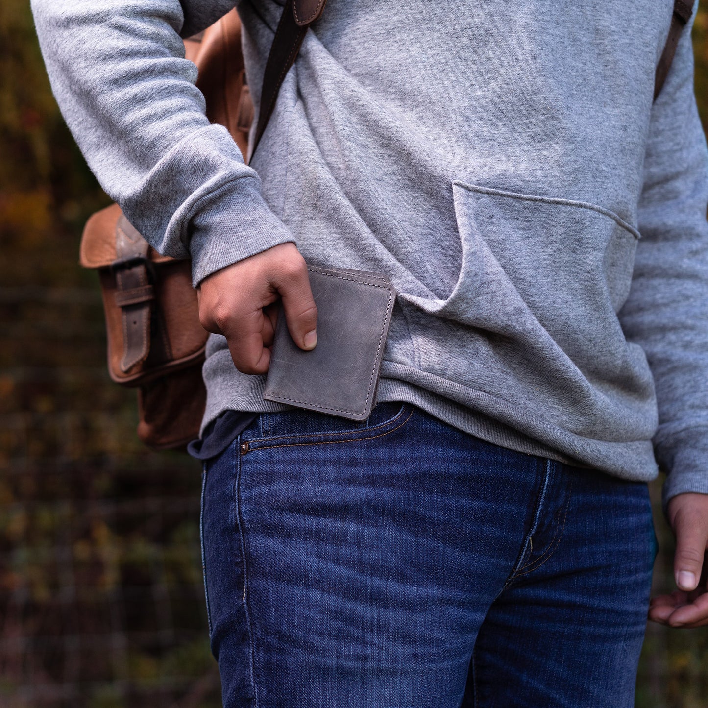 Knox Bifold Wallet in Rock—sleek, handcrafted leather wallet with 3 card slots, hidden pockets, and fire-branded initials for a personal touch.