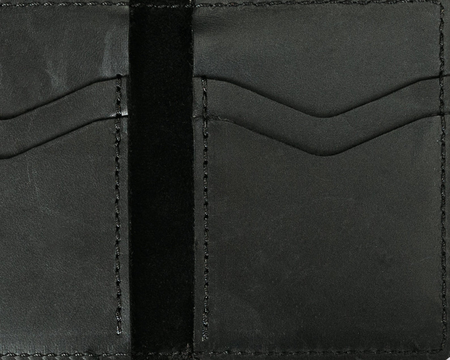 Close-up of the Woodford Leather Bifold Wallet in Charcoal Black, showcasing its slim design, rich top-grain leather texture, and personalized initials embossing.