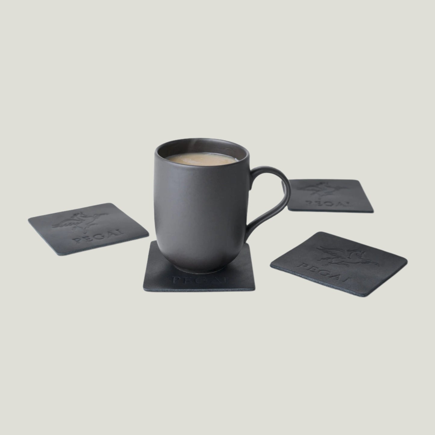 Black Kirby Leather Coaster Set by Atelier PEGAI, crafted in Ubrique, Spain—showcasing premium craftsmanship and Tanner Leatherstein’s expertise.