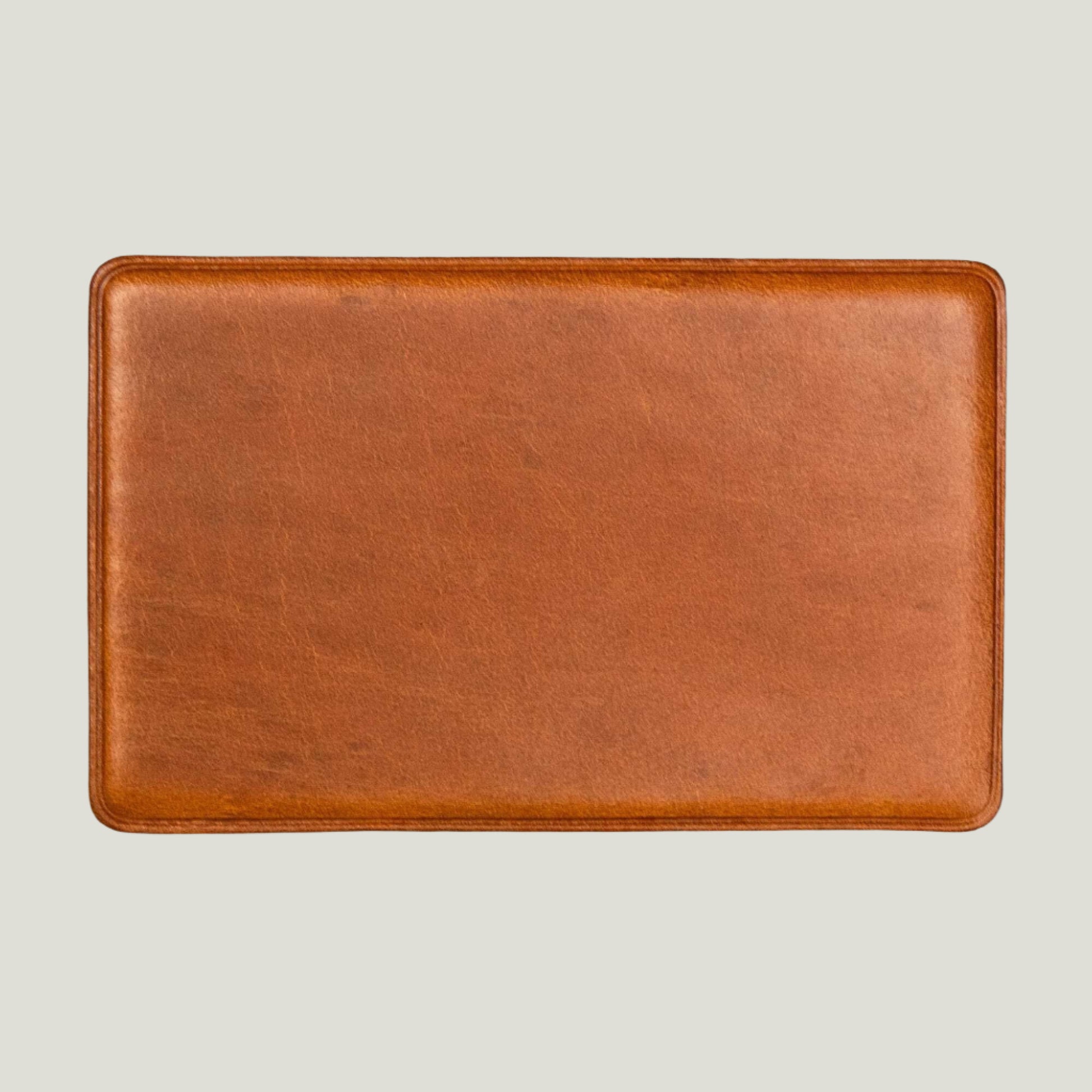 Whiskey Brown leather NFC business card with personalized engraving, crafted by Atelier PEGAI for seamless digital networking and a lasting first impression.