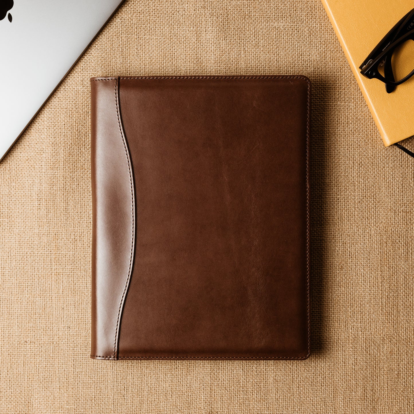 Slim leather padfolio in Barkley Brown with pen holder, business card pocket, and A4 folder—crafted by Tanner Leatherstein for legal pads.