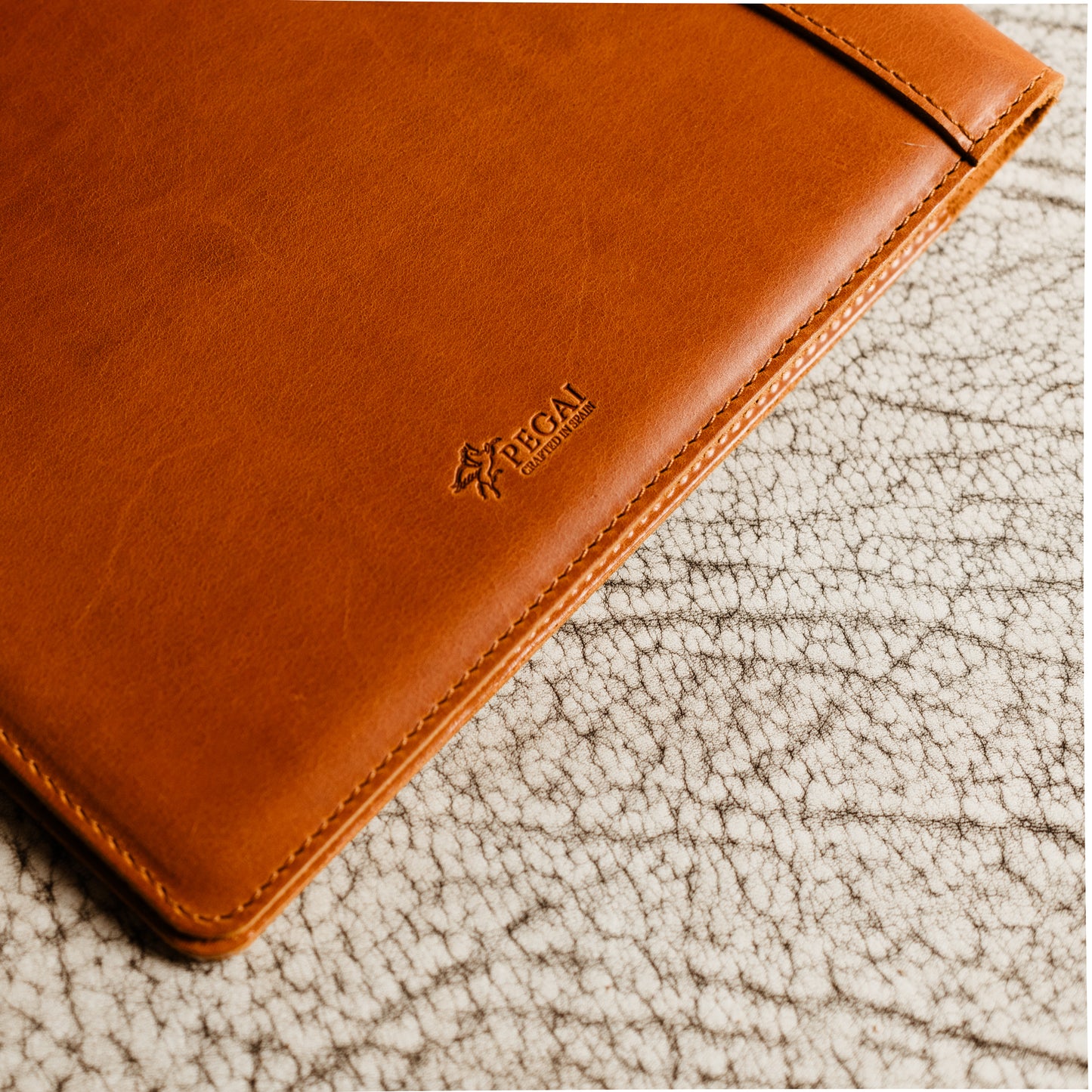 Handcrafted leather padfolio in Whiskey Cognac with pen holder, card pocket, and folder slot—designed by Tanner Leatherstein for legal pads.