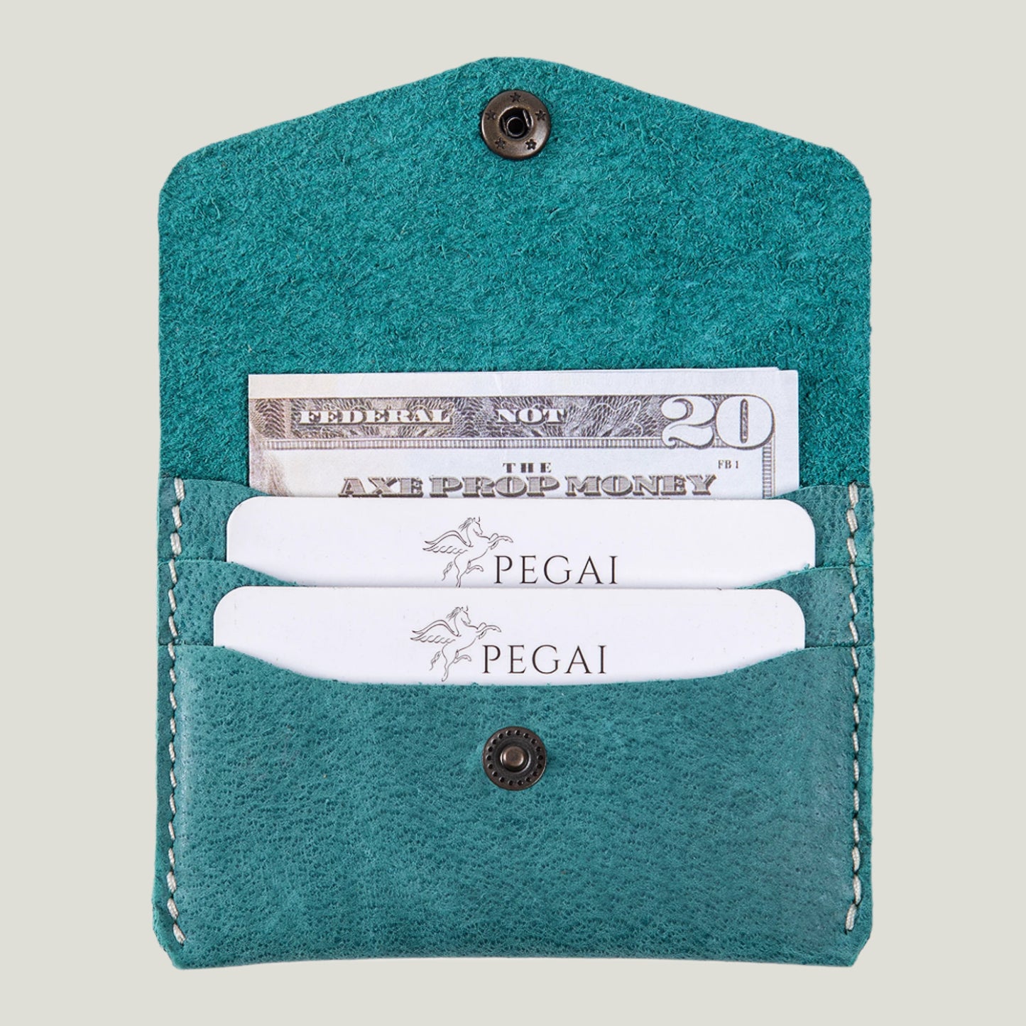 Turquoise Green Seline Leather Card Holder by Atelier PEGAI—handmade in Ubrique, Spain. Slim, stylish, and holds up to 6 cards. Personalizable with fire-branded initials.