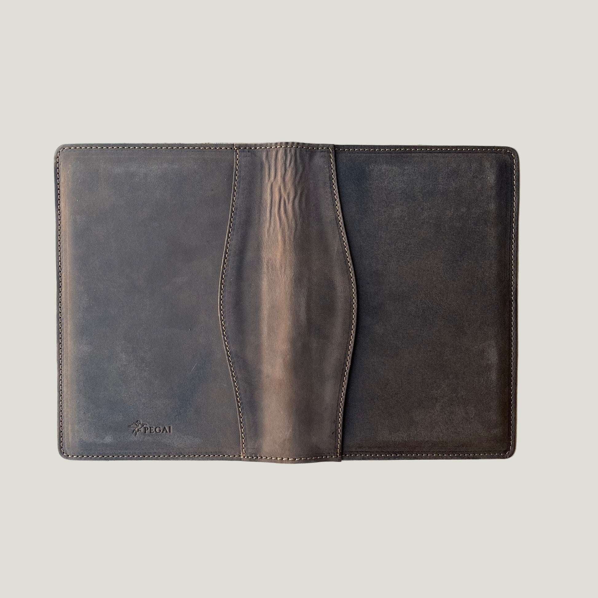 Back view of the leather padfolio in distressed chestnut brown, featuring natural wrinkles that highlight craftsmanship.