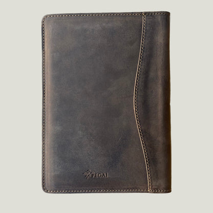 Closed leather padfolio in rugged chestnut finish with PEGAI logo—ideal for daily carry, journaling, or gifting.
